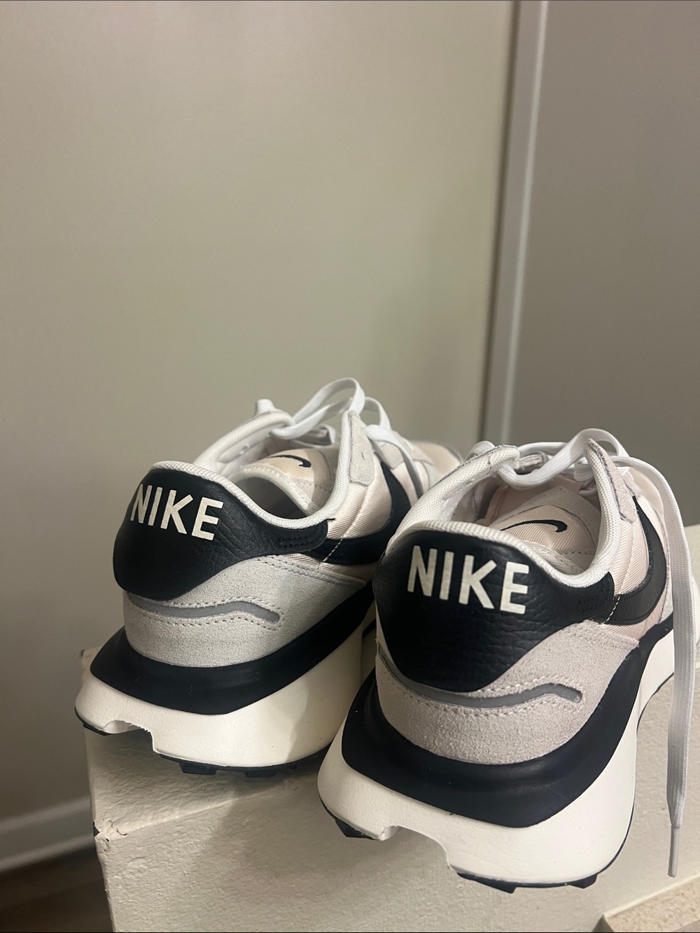 Nike Sail and Black Retro-Style Trainers